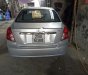 Daewoo Lacetti số sàn 2004 - Cần bán xe Daewoo Lacetti số sàn đời 2004, màu bạc