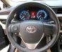 Toyota Corolla altis 1.8AT 2016 - Bán Toyota Corolla Altis 1.8AT đời 2016, màu đen xe gia đình, giá 680tr