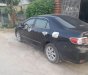 Toyota Corolla altis 1.8MT 2011 - Cần bán gấp Toyota Corolla Altis 1.8MT đời 2011, màu đen chính chủ, giá tốt