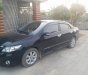 Toyota Corolla altis 1.8MT 2011 - Cần bán gấp Toyota Corolla Altis 1.8MT đời 2011, màu đen chính chủ, giá tốt