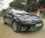Toyota Corolla altis 1.8AT 2016 - Bán Toyota Corolla Altis 1.8AT đời 2016, màu đen xe gia đình, giá 680tr