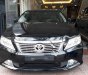 Toyota Camry 2.0E 2014 - Bán Toyota Camry 2.0E sản xuất 2014, màu đen như mới