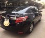 Toyota Vios 1.5E 2016 - Cần bán lại xe Toyota Vios 1.5E sản xuất 2016, màu đen số sàn