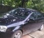 Daewoo Lacetti EX 1.6 MT 2004 - Bán xe Daewoo Lacetti EX 1.6 MT sản xuất 2004, màu đen