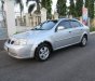 Daewoo Lacetti EX 1.6 MT 2004 - Bán xe Daewoo Lacetti EX 1.6 MT 2004, màu bạc 