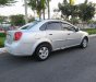 Daewoo Lacetti EX 1.6 MT 2004 - Bán xe Daewoo Lacetti EX 1.6 MT 2004, màu bạc 