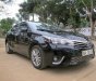 Toyota Corolla altis 1.8G AT 2016 - Bán Toyota Corolla altis 1.8G AT năm 2016, màu đen  