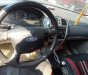 Ford Laser Ghia 1.8 MT 2003 - Bán Ford Laser Ghia 1.8 MT năm 2003, màu xám giá cạnh tranh