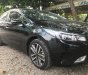 Kia Cerato 2.0 AT 2016 - Cần bán lại xe Kia Cerato 2.0 AT năm sản xuất 2016, màu đen như mới