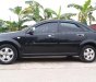 Chevrolet Lacetti EX 2013 - Bán xe Chevrolet Lacetti EX sản xuất 2013, màu đen còn mới, giá chỉ 285 triệu