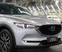 Mazda CX 5 2018 - Mazda Bình Tân cần bán xe CX-5 2.5L 2WD 2018 màu trắng, hỗ trợ vay 90%, xe giao ngay. Lh 0869919151 gặp Phúc Thịnh