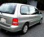 Kia Carnival 2009 - Cần bán Kia Carnival 2009, màu bạc chính chủ