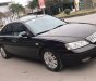 Ford Mondeo AT 2004 - Bán xe Ford Mondeo số tự động, sản xuất 2004 màu đen, giá tốt