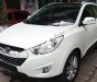 Hyundai Tucson 2.0 AT 4WD 2011 - Bán Hyundai Tucson 2.0 AT 4WD 2011, màu trắng, xe nhập