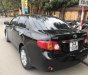 Toyota Corolla altis 1.8G MT 2010 - Bán Toyota Corolla altis 1.8G MT đời 2010, màu đen  