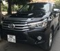 Toyota Hilux 3.0G AT 2016 - Bán Toyota Hilux 3.0G AT đời 2016, màu đen như mới