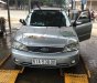 Ford Laser LXi 1.6 MT 2004 - Chính chủ bán Ford Laser LXi 1.6 MT đời 2004, màu bạc