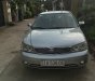 Ford Laser LXi 1.6 MT 2004 - Chính chủ bán Ford Laser LXi 1.6 MT đời 2004, màu bạc