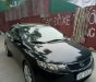 Kia Cerato 1.6 AT 2010 - Bán xe Kia Cerato 1.6 AT sản xuất 2010, màu đen, nhập khẩu