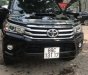 Toyota Hilux 3.0G AT 2016 - Bán Toyota Hilux 3.0G AT đời 2016, màu đen như mới