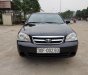 Daewoo Lacetti 2010 - Cần bán lại xe Daewoo Lacetti sản xuất 2010, màu đen