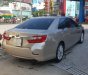 Toyota Camry 2013 - Bán Toyota Camry năm 2013, màu vàng