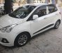 Hyundai Grand i10 2015 - Chính chủ bán Hyundai Grand i10 đời 2015, màu trắng