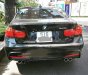 BMW 3 Series 320i 2014 - Bán xe BMW 3 Series 320i đời 2014, màu đen, xe nhập 