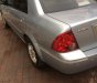 Ford Laser LXi 1.6 MT 2005 - Bán Ford Laser LXi 1.6 MT sản xuất 2005, màu bạc 