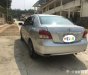 Toyota Vios   2010 - Cần bán Toyota Vios 2010, màu bạc