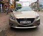 Mazda 3 1.5AT 2016 - Bán ô tô Mazda 3 1.5AT đời 2016, màu vàng  