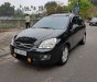 Kia Carens 2.0 MT 2009 - Bán xe Kia Carens 2.0 MT 2009, màu đen, xe nhập