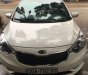 Kia K3 2.0 AT 2015 - Bán Kia K3 2.0 sản xuất 2015, màu trắng đã đi 30.000km, 590tr