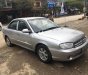 Kia Spectra 2004 - Cần bán xe Kia Spectra đời 2004, màu bạc, giá 108tr