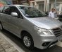 Toyota Innova 2.0E 2014 - Cần bán gấp Toyota Innova 2.0E năm 2014, màu bạc