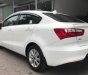 Kia Rio  1.4 AT  2015 - Cần bán xe Kia Rio 1.4 AT đời 2015, màu trắng số tự động