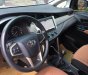 Toyota Innova 2.0E 2017 - Cần bán Toyota Innova E đời 2017, màu vàng số sàn