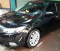 Kia Cerato 1.6 AT 2011 - Cần bán lại xe Kia Cerato 1.6 AT sản xuất năm 2011, màu đen, nhập khẩu chính chủ