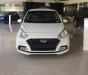 Hyundai Grand i10 1.2  MT Base 2018 - Bán Hyundai Grand i10 1.2 MT Sedan Base sản xuất 2018, màu trắng