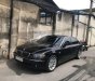 BMW 7 Series  750Li  2006 - Cần bán BMW 7 Series 750Li 2006, màu đen, giá chỉ 750 triệu