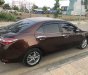 Toyota Corolla altis 2016 - Cần bán lại xe Toyota Corolla altis đời 2016, màu nâu chính chủ, giá 720tr