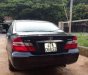 Toyota Camry 2003 - Bán xe Toyota Camry 2003, màu đen, số sàn, giá chỉ 295 triệu