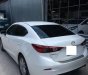 Mazda 3 1.5AT 2015 - Bán ô tô Mazda 3 1.5AT đời 2015, màu trắng xe gia đình