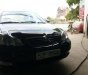 Toyota Corolla altis 2005 - Cần bán lại xe Toyota Corolla altis đời 2005, màu đen