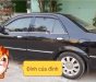 Ford Laser GHIA 1.8 AT 2004 - Bán ô tô Ford Laser GHIA 1.8 AT sản xuất năm 2004, màu đen