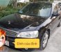 Ford Laser GHIA 1.8 AT 2004 - Bán ô tô Ford Laser GHIA 1.8 AT sản xuất năm 2004, màu đen