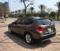 BMW X1   2010 - Bán xe BMW X1 năm 2010, màu nâu, nhập khẩu chính chủ, 620tr