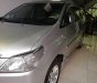 Toyota Innova 2.0E 2014 - Cần bán gấp Toyota Innova 2.0E đời 2014, màu bạc xe gia đình