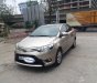 Toyota Vios E 2016 - Cần bán Toyota Vios E sản xuất 2016, màu vàng