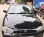 Kia Spectra 2003 - Cần bán lại xe Kia Spectra 2003, màu đen